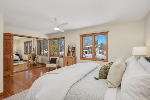 bedroom featuring ceiling fan and wood finished floors