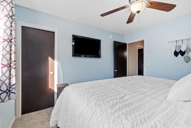 bedroom with carpet flooring and a ceiling fan