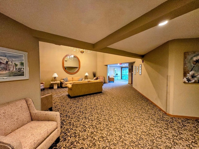 interior space with carpet flooring, vaulted ceiling with beams, and baseboards