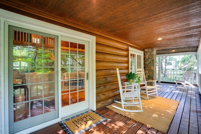 deck with french doors and a porch