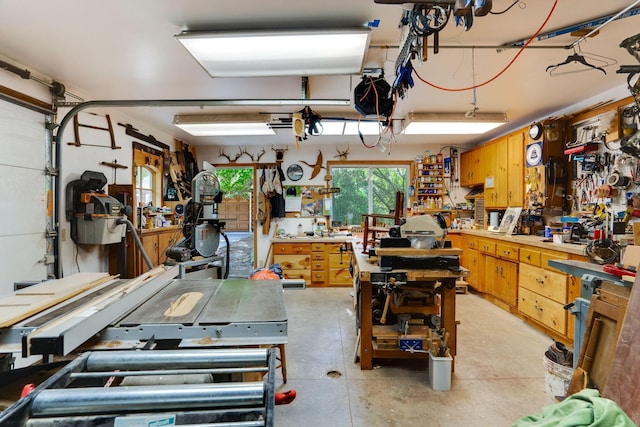 garage with a workshop area