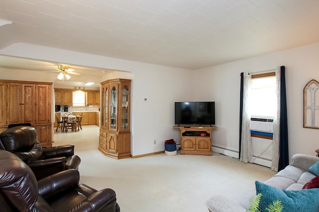 21 1st St NE, Fairfax, MN 55332 - living area with light carpet, a baseboard radiator, ceiling fan, and cooling unit