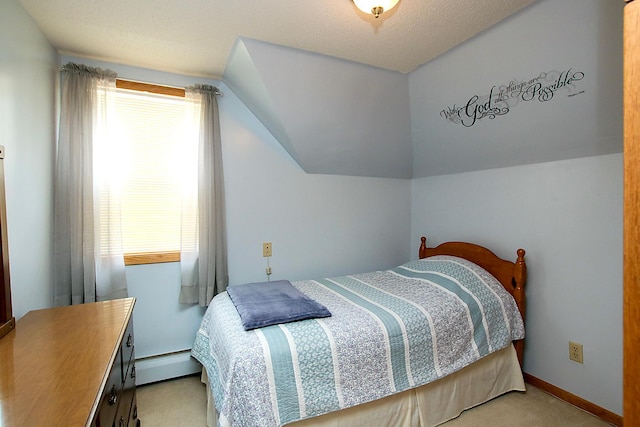 21 1st St NE, Fairfax, MN 55332 - bedroom with light carpet, a baseboard heating unit, and vaulted ceiling