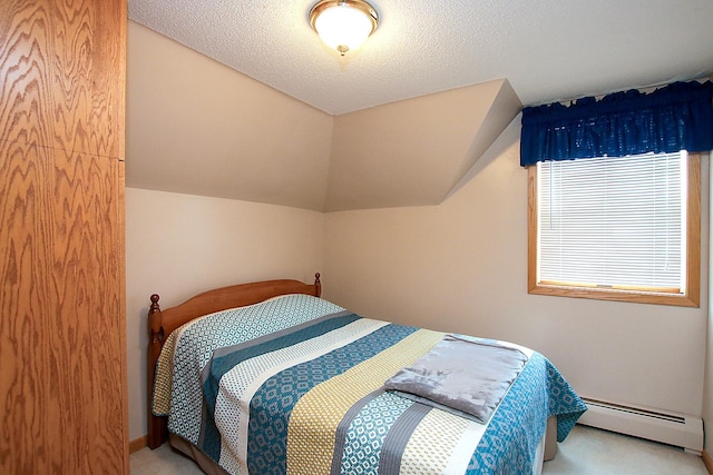 21 1st St NE, Fairfax, MN 55332 - carpeted bedroom with a baseboard radiator and vaulted ceiling