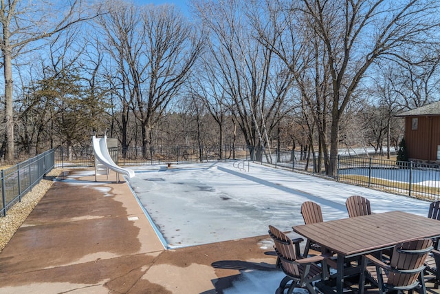 view of yard with a patio area, outdoor dining space, and fence