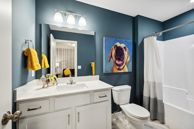 full bathroom featuring toilet, shower / tub combo, and vanity