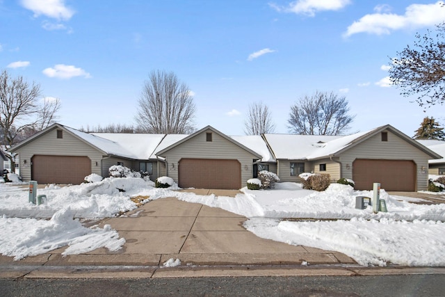 ranch-style home featuring an attached garage