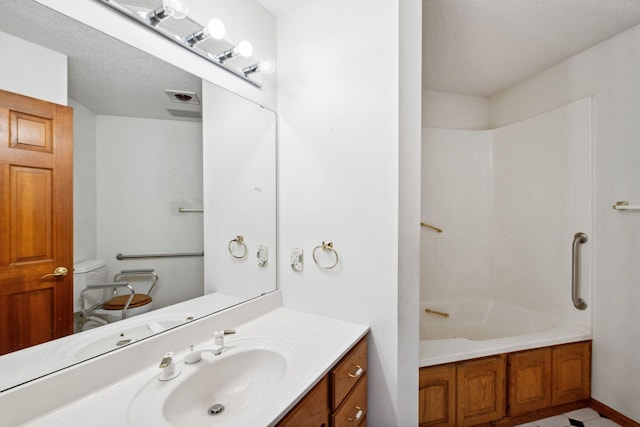 full bath featuring shower / tub combination, a textured ceiling, and vanity