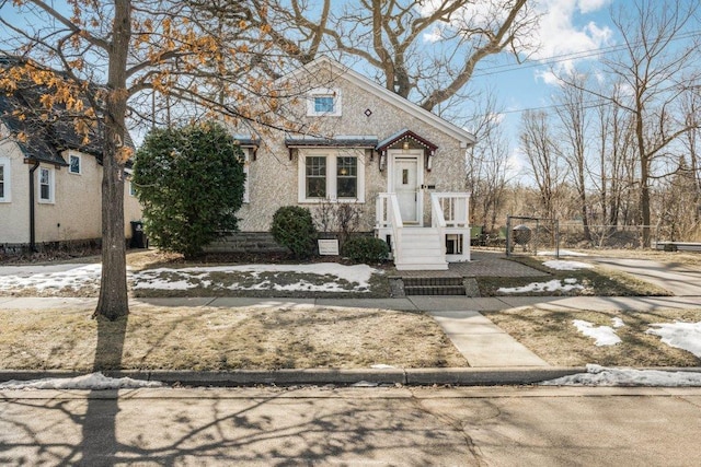 view of front of house with fence