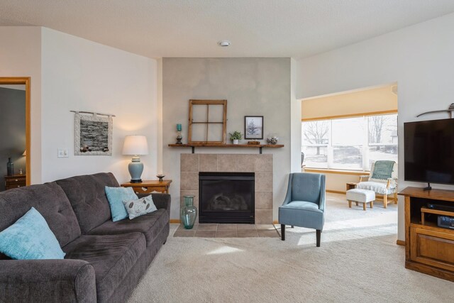 carpeted living room with a fireplace