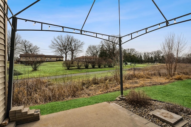 view of patio / terrace featuring a lanai