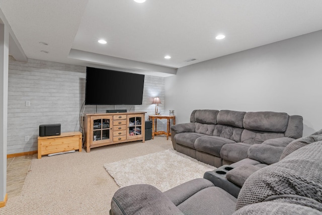 living area with recessed lighting, visible vents, baseboards, and carpet flooring