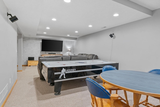 recreation room featuring recessed lighting, visible vents, and light carpet