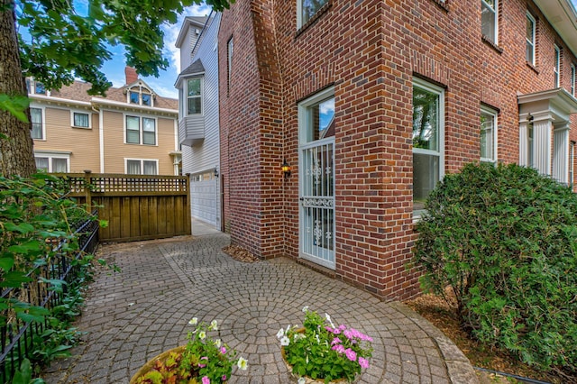 355 Laurel Ave, Saint Paul, MN 55102 - view of patio featuring driveway