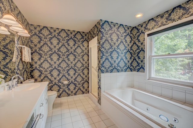 355 Laurel Ave, Saint Paul, MN 55102 - full bath with tile patterned floors, a whirlpool tub, wallpapered walls, vanity, and a shower stall