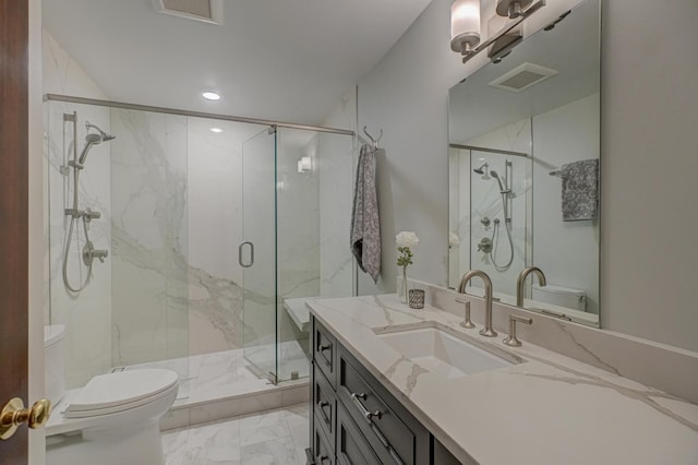 355 Laurel Ave, Saint Paul, MN 55102 - bathroom featuring marble finish flooring, vanity, a marble finish shower, and recessed lighting