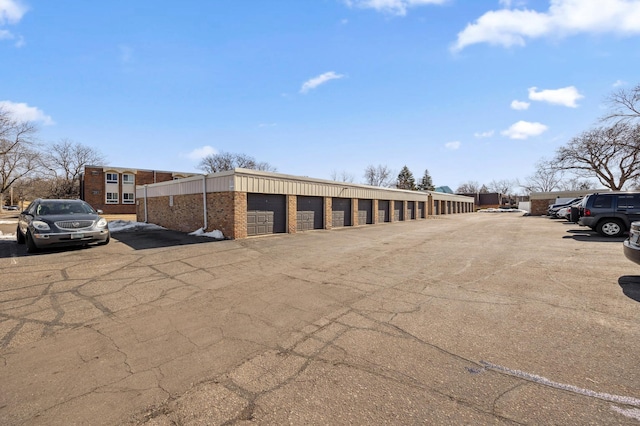 view of street with community garages