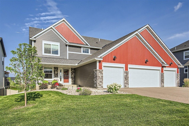 craftsman-style home with a front yard, stone siding, driveway, and an attached garage