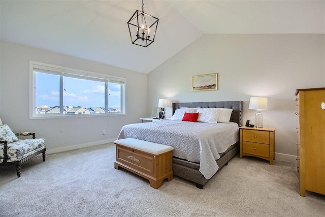 bedroom featuring light colored carpet, vaulted ceiling, baseboards, and an inviting chandelier