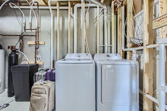 laundry room with laundry area and separate washer and dryer