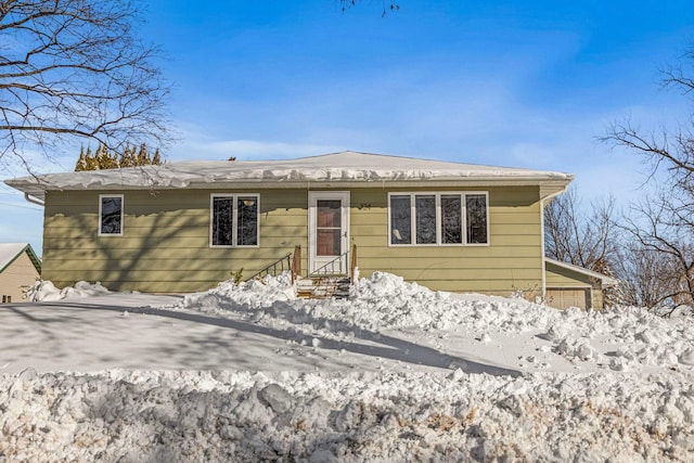 view of front of property with a garage and entry steps