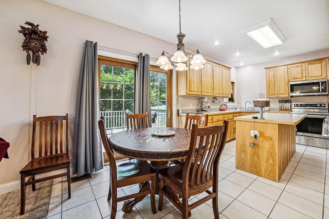 dining area with a notable chandelier, light tile patterned flooring, and recessed lighting