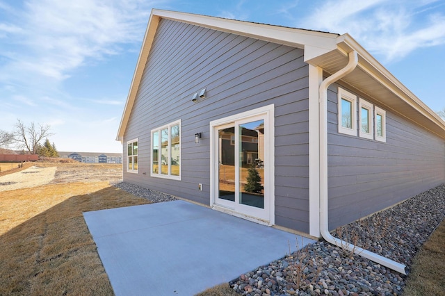 view of home's exterior with a patio