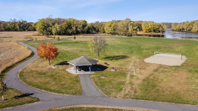 aerial view featuring a water view and a view of trees