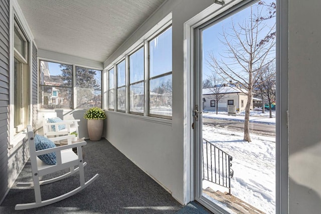 sunroom / solarium with a wealth of natural light