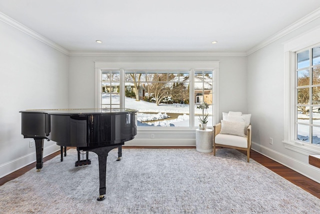 sitting room featuring recessed lighting, ornamental molding, baseboards, and wood finished floors