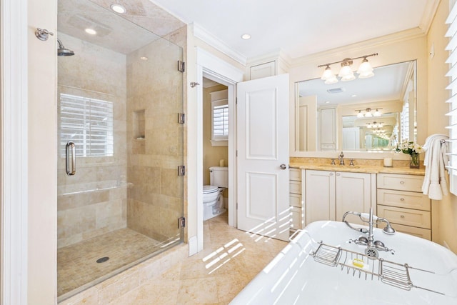 bathroom with a soaking tub, a stall shower, toilet, and ornamental molding