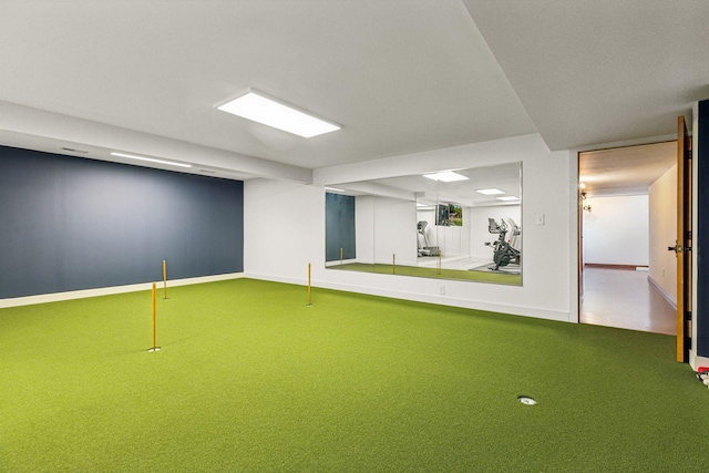 6601 Dovre Dr, Edina, MN 55436 - below grade area with an area to practice putting, carpet, and baseboards