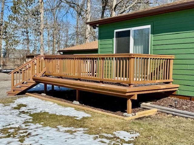 view of snow covered deck