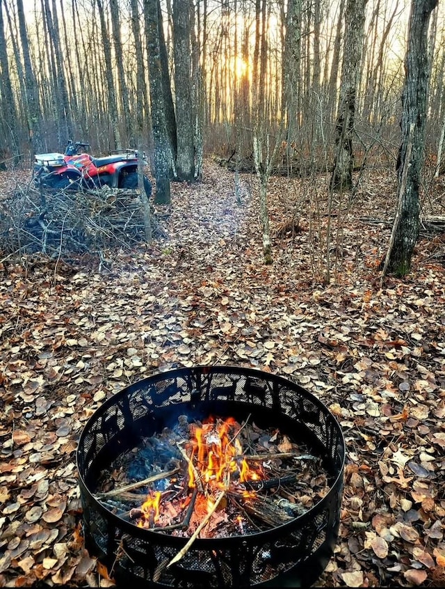 exterior details with a fire pit