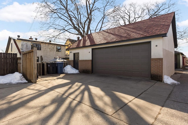 detached garage with fence