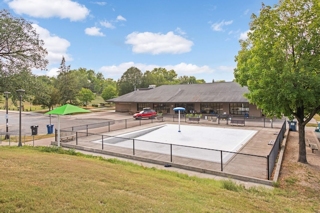 exterior space featuring a yard and fence