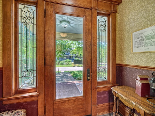 857 Fairmount Ave, Saint Paul, MN 55105 - foyer entrance with wallpapered walls and french doors