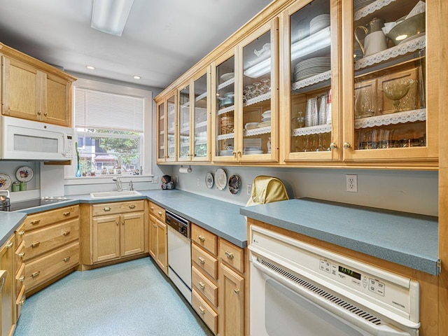 857 Fairmount Ave, Saint Paul, MN 55105 - kitchen featuring white appliances, glass insert cabinets, and light brown cabinets