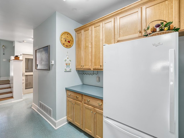 857 Fairmount Ave, Saint Paul, MN 55105 - kitchen featuring freestanding refrigerator and baseboards