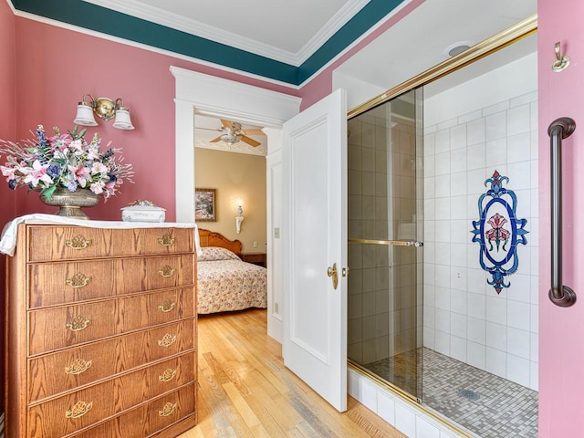 857 Fairmount Ave, Saint Paul, MN 55105 - ensuite bathroom with a shower stall, hardwood / wood-style flooring, crown molding, and ceiling fan