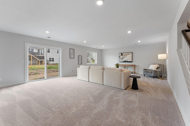 17771 Elkwood Ct, Lakeville, MN 55024 - living room featuring carpet flooring, recessed lighting, baseboards, and stairs