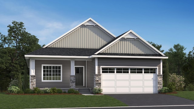 craftsman inspired home with a garage, stone siding, a front lawn, and board and batten siding