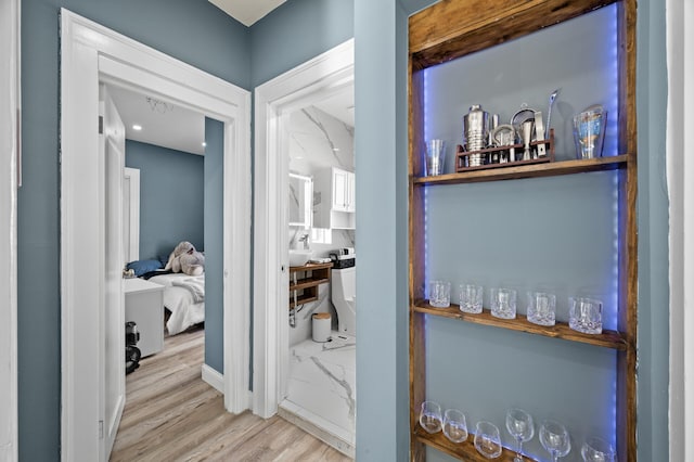 hallway with wood finished floors