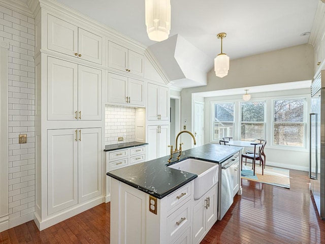 kitchen featuring dark wood-type flooring, a sink, stainless steel dishwasher, tasteful backsplash, and hanging light fixtures