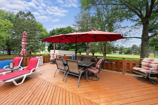 deck with outdoor dining space