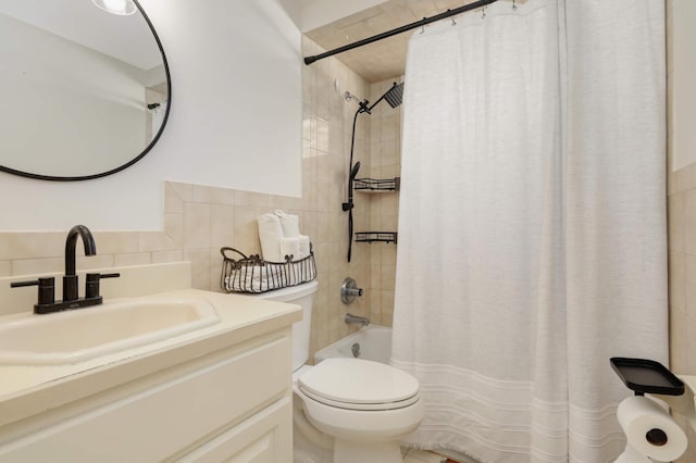 full bathroom with shower / bathtub combination with curtain, tile walls, toilet, and vanity