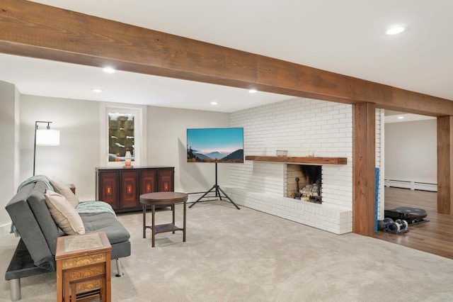 carpeted living room featuring a baseboard heating unit, recessed lighting, a brick fireplace, and beamed ceiling