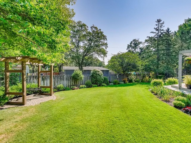 view of yard featuring fence