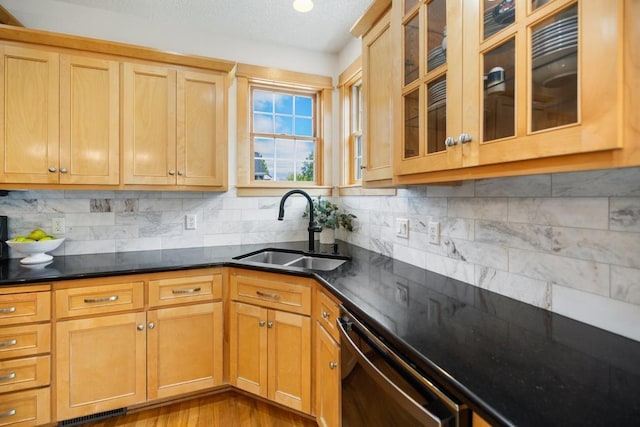 11050 Sweetwater Path, Woodbury, MN 55129 - kitchen with a sink, dishwasher, tasteful backsplash, and glass insert cabinets