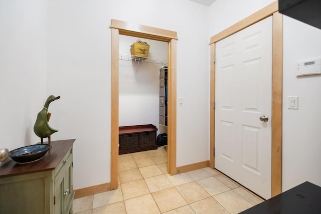 11050 Sweetwater Path, Woodbury, MN 55129 - foyer with baseboards and light tile patterned floors